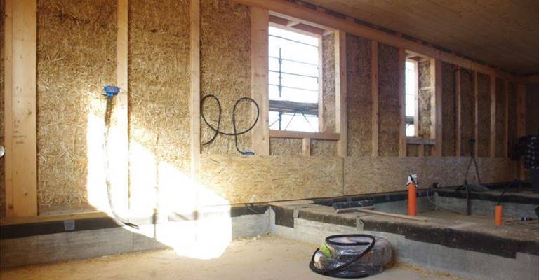 Case di legno e paglia